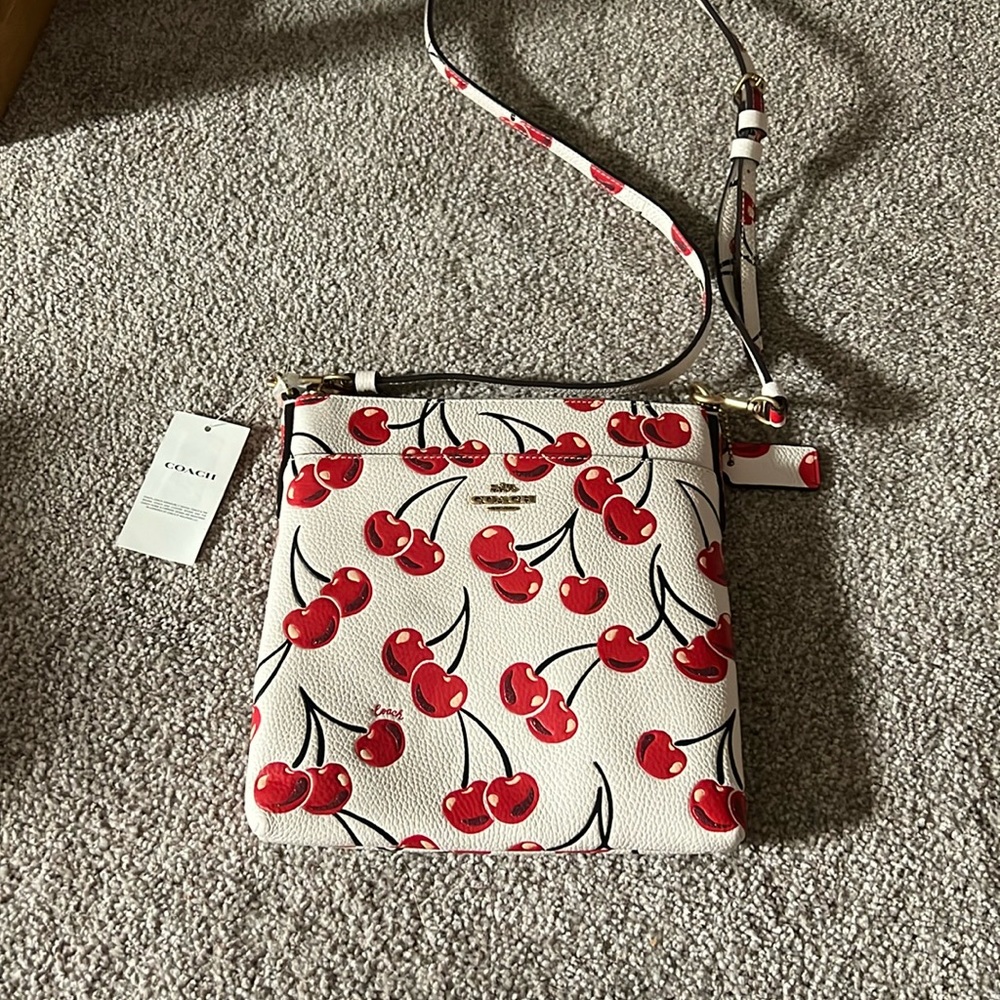 Coach purse with sparkly cherries